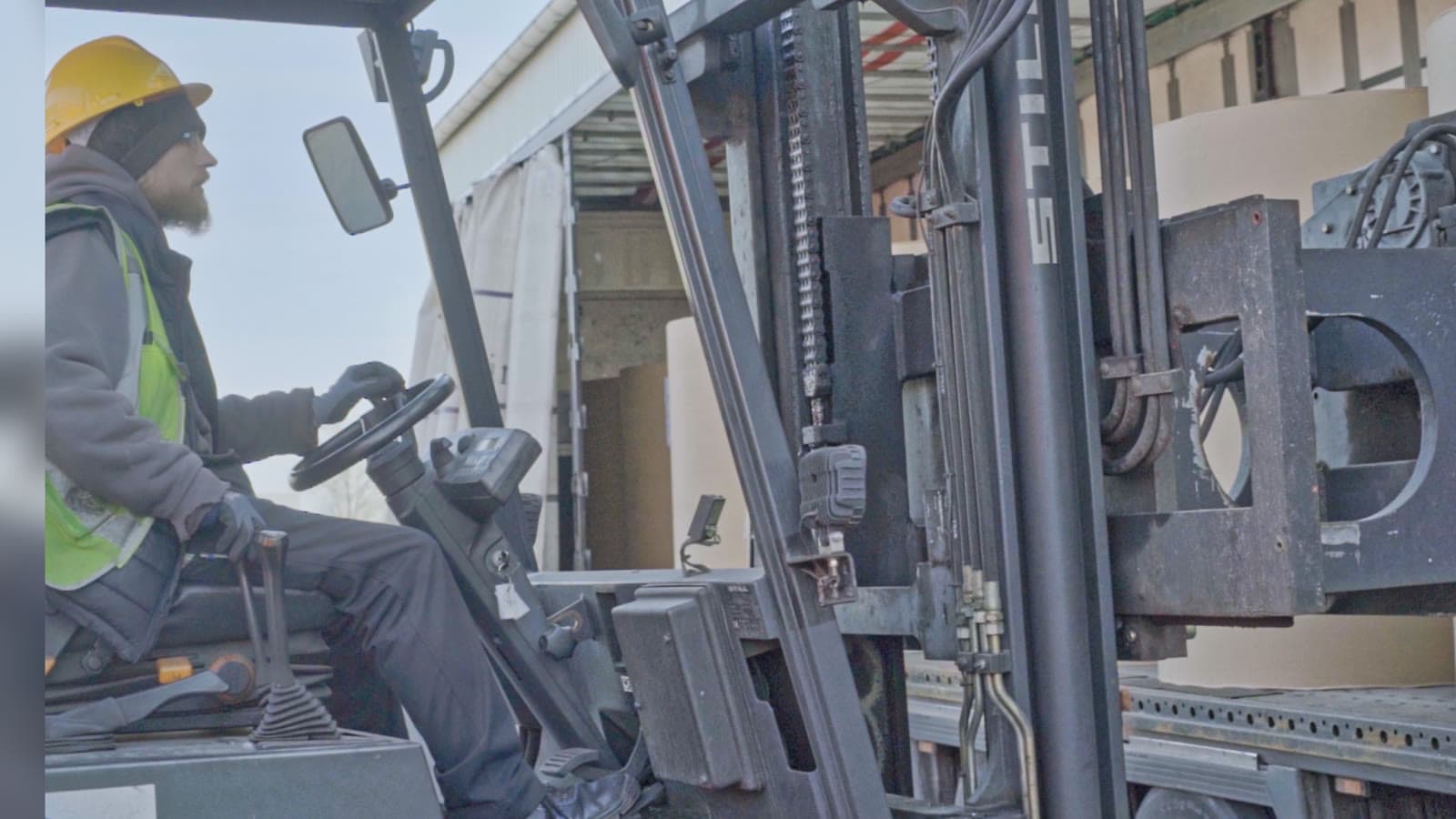 Forklift driver at work at the seaport of Rostock